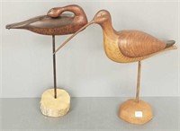 2 carved & painted curlews on stands - 1 signed