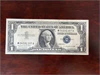 1957 A $1 Dollar Silver Certificate with blue seal