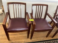 PAIR OF WOODEN ARM CHAIRS WITH VINYL SEATS. NEED R