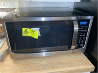 OSTER COUNTER TOP MICROWAVE