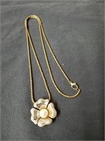 Vintage flower pendant marked 925 with gold