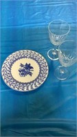 Decorative plate and two wine glasses