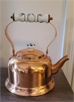 Copper tea kettle with buttons