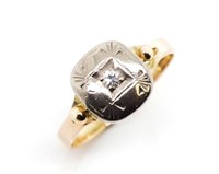 Early 20th C. Diamond and two tone gold ring