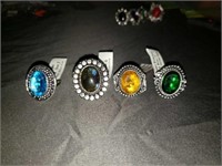 Citrine, blue topaz, labradorite, emerald Rings