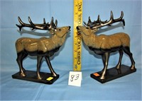 2 elk figurines