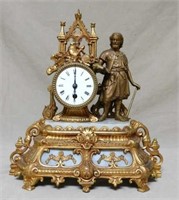 French Gilt Metal and Marble Figural Clock.