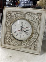 White-carved hanging wall clock