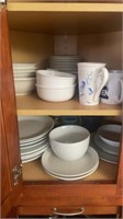Contents in cabinet , plates, cereal bowls, cups