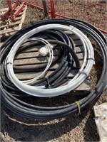 Quantity of 1 inch black hose and a quantity of