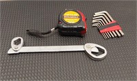 Tape measure, Allen wrenches, master wrench