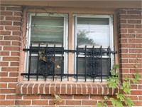 Wrought iron window panel, 1 piece looks like 2