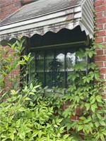 Wrought iron window panel left side