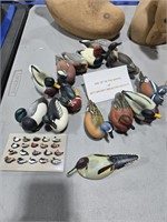 Wooden duct decoys and miniature decoys as shown