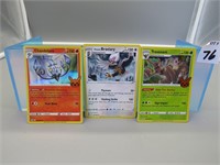 Three Assorted Pokemon Cards