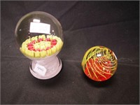 Two paperweights: one is 4 1/4" high, one