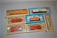 Seven Boxed Lifelike Train Cars