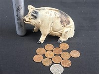 cast Iron sitting pig Bank with 1965 Quarter