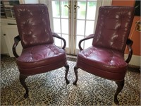 Pair of leather open arm chairs