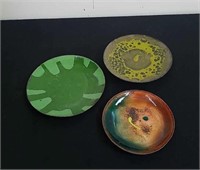Group of enameled copper saucers