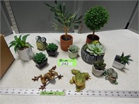 Faux succulents and frog figurines