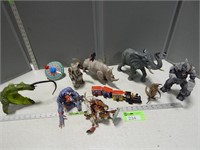 Toy animals, action figures, metal top and train