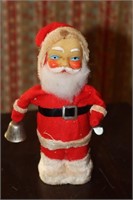 Wind up mechanical Santa Claus ringing a bell