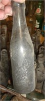 LOT OF EMBOSSED DR PEPPER BOTTLES - B