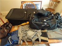 Assorted Suitcases and Duffel Bags