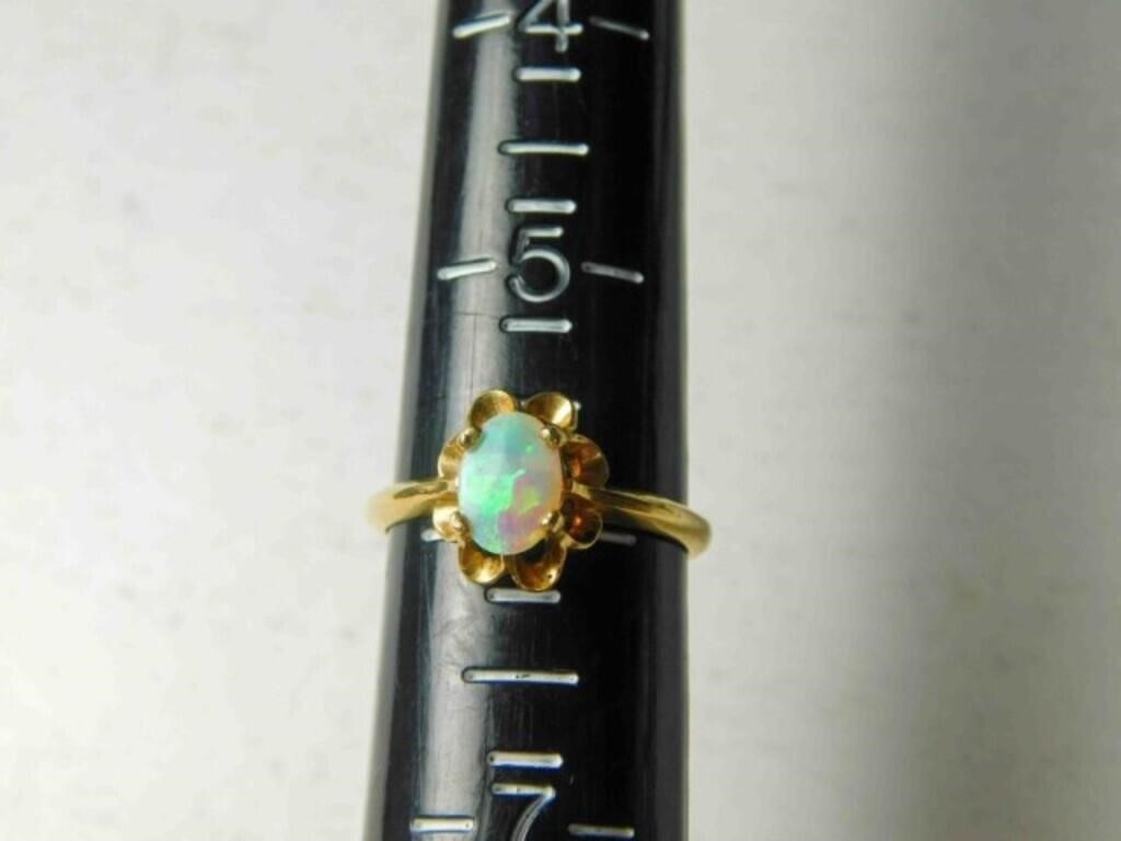 14k ring with 7mm x 5mm opal size 6