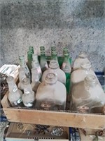 Wooden crate of dairy bottles crush