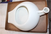 Ceramic urinal-Crack on the back side see photo