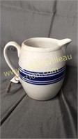 White and blue stoneware pitcher 6in