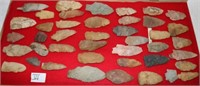COLLECTION OF 42 CARVED STONE POINTS &