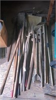 Rakes pitchforks shovels lot