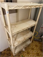 4 tier white plastic shelf, needs cleaning