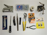 Stapler, screws, slip joint pliers, allen wrenches