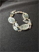 Mexican silver bracelet with toggle clasp.