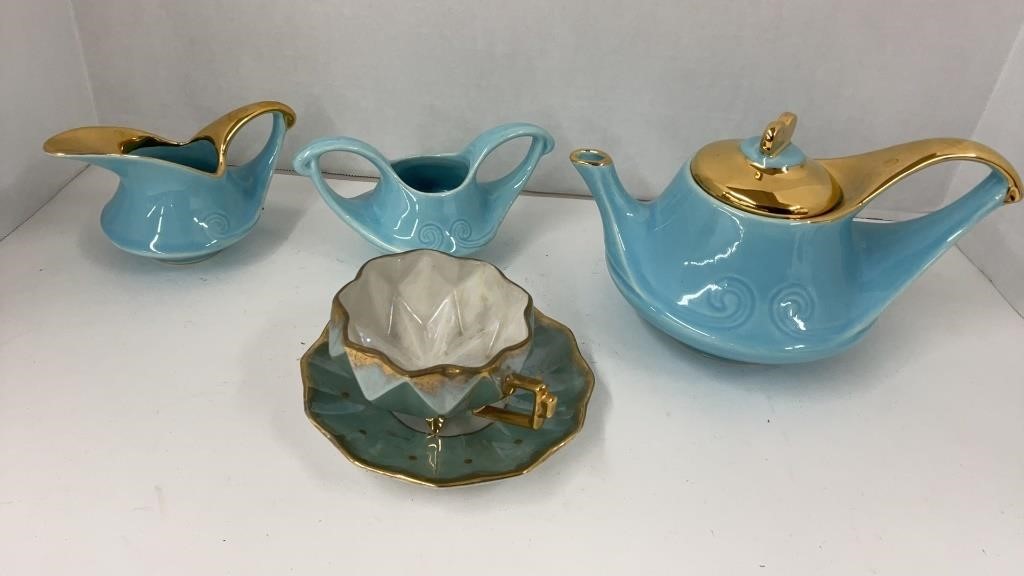 Azure blue teapot with sugar and creamer and