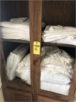 Bedspread & Towels in Cabinet