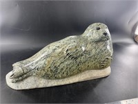 Michael Scott soapstone carving of a breeching wha