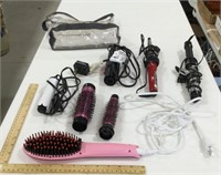 Bathroom lot w/ brushes, curling irons, & storage