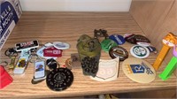 Miscellaneous lot of keychains, pins and more