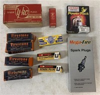 11 spark plug packages; all full except 2