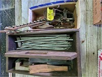 flat of drill bits, C-clamps, wooden crate, metal