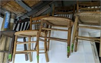 Assorted Chairs Hanging From Rafters