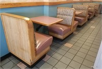 Small diner banquets, tables attached to wall
