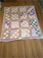 Hand stitched gingham square quilt