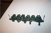 Cast iron frog hanger