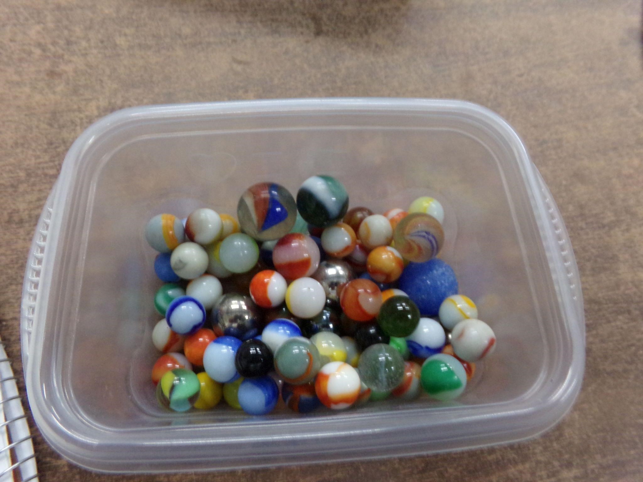 75 old marbles